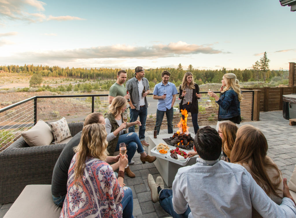 Group Enjoying Food and Drink at Bend Oregon Lodging