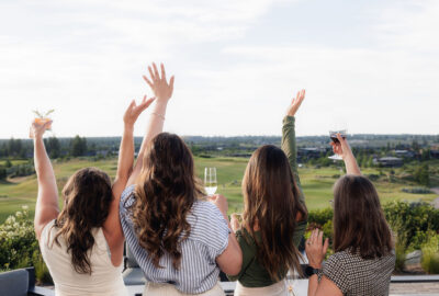 Women Toasting with view of golf course